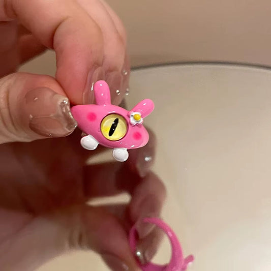 Anillo punk rosado ajustable